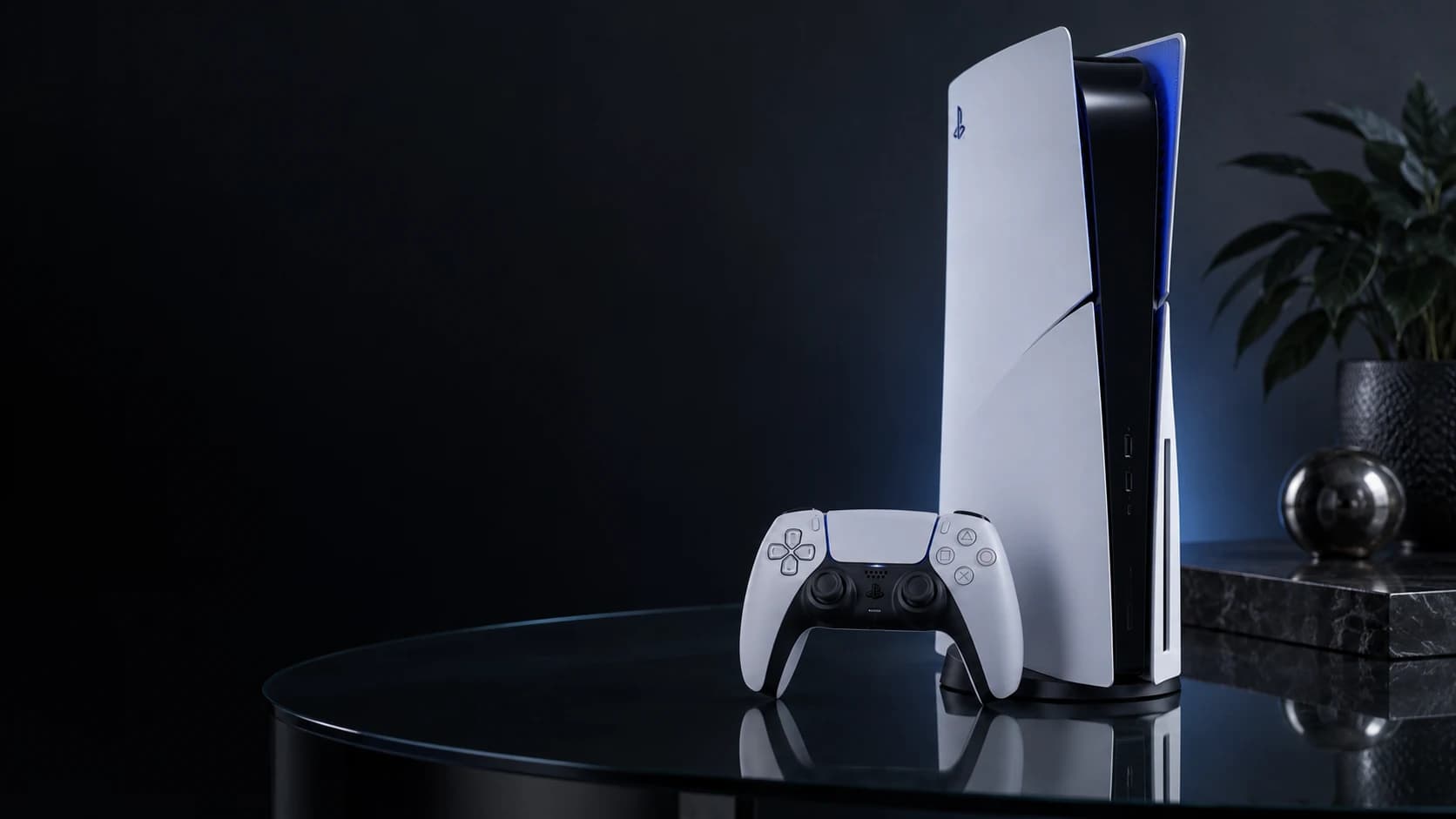 White gaming console and controller in a softly lit charcoal studio
